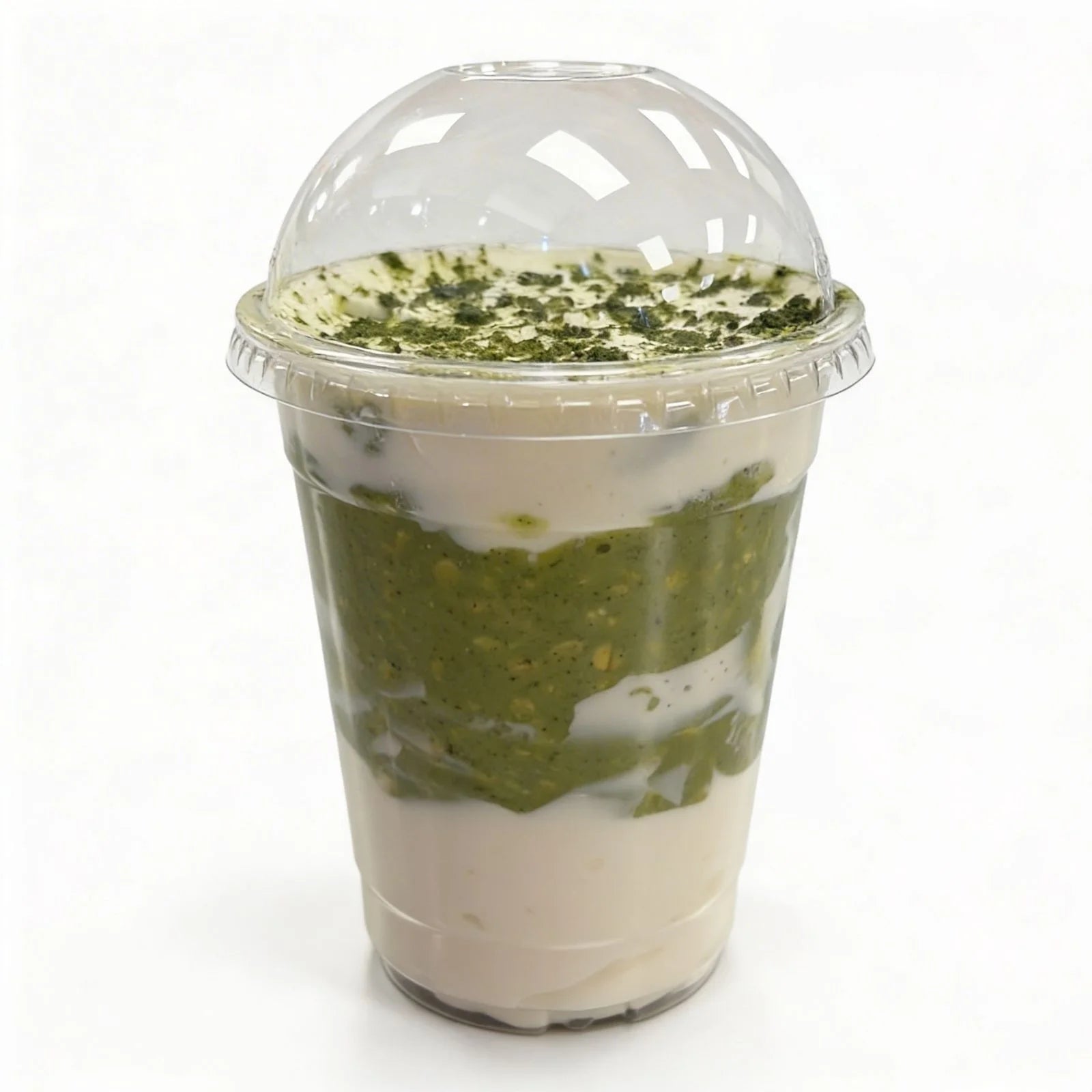 Japanese organic matcha protein oatmeal in a clear plastic container with a lid on a white background