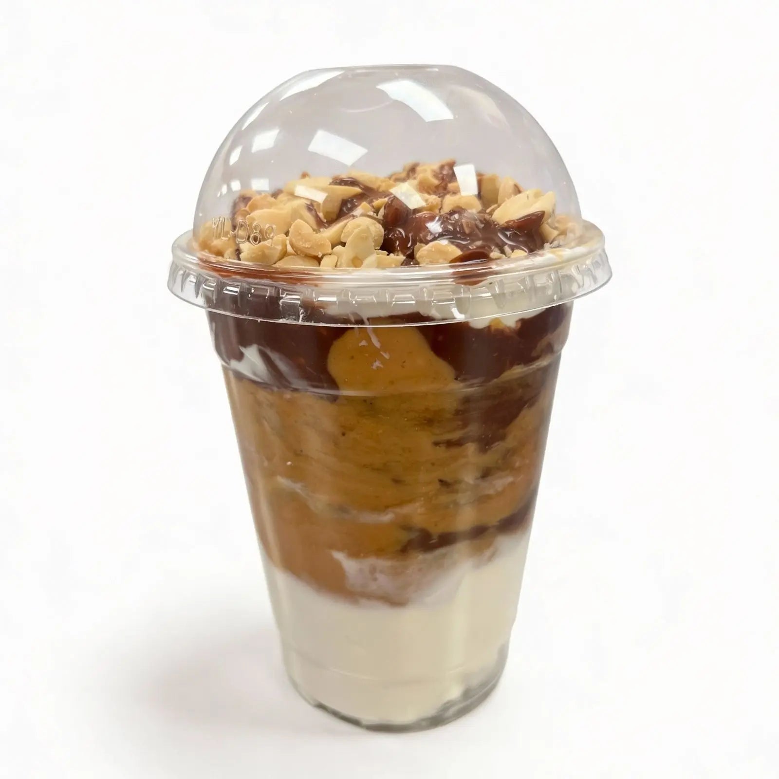 Chocolate peanut protein oatmeal with nuts on a white background