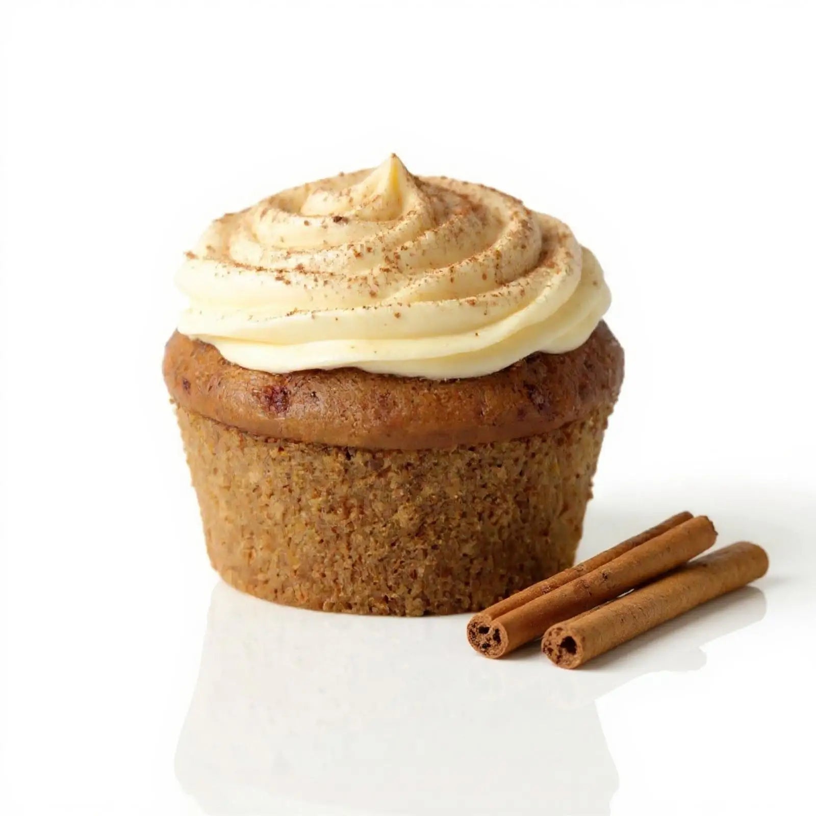 Emberly cinnamon protein muffin with cream frosting and cinnamon sticks