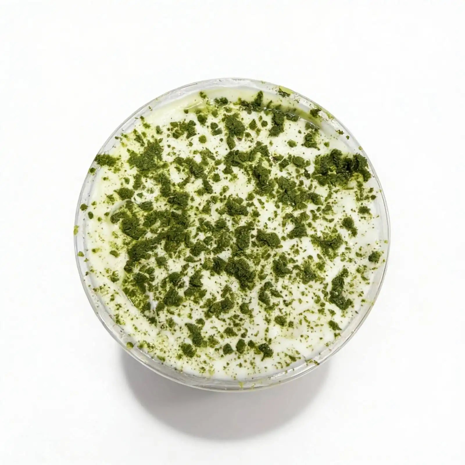 Top of Japanese organic matcha protein oatmeal on a white background